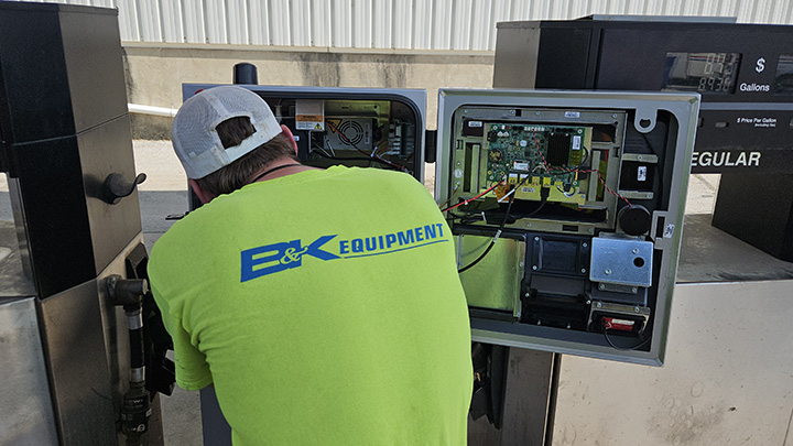 Technician installing Gasboy card reader